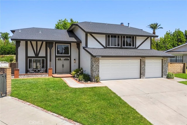 20660 Calle Feliz, Yorba Linda, CA 92886 - view of front of house with driveway, a front lawn, stucco siding, and an attached garage