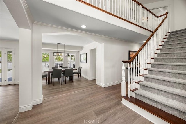 20660 Calle Feliz, Yorba Linda, CA 92886 - foyer featuring ornamental molding, wood finished floors, stairway, arched walkways, and recessed lighting