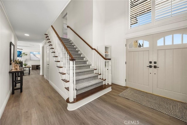20660 Calle Feliz, Yorba Linda, CA 92886 - foyer entrance featuring stairs, wood finished floors, recessed lighting, and a towering ceiling
