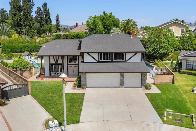 20660 Calle Feliz, Yorba Linda, CA 92886 - english style home with an attached garage, driveway, roof with shingles, and stucco siding