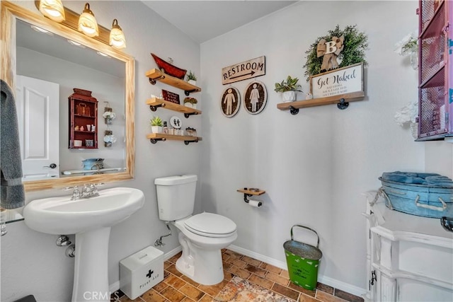2832 Owens Way, Rosamond, CA 93560 - bathroom with toilet and baseboards