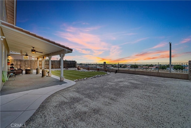 2832 Owens Way, Rosamond, CA 93560 - patio terrace at dusk with a ceiling fan and a patio