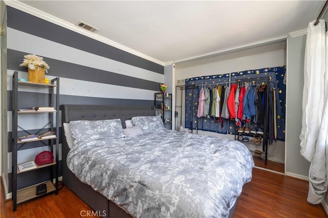 8568 Century Blvd Unit B, Paramount, CA 90723 - bedroom with ornamental molding, wood finished floors, and baseboards
