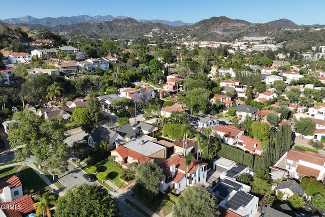 1338 Carmen Dr, Glendale, CA 91207 - aerial overview of property's location featuring a mountain backdrop and nearby suburban area