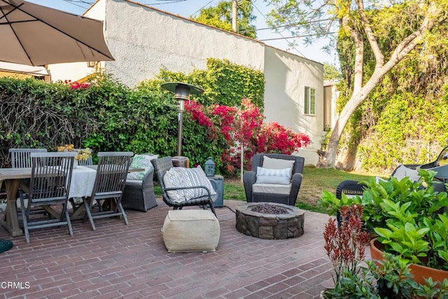 1338 Carmen Dr, Glendale, CA 91207 - view of patio / terrace featuring an outdoor fire pit and outdoor dining space