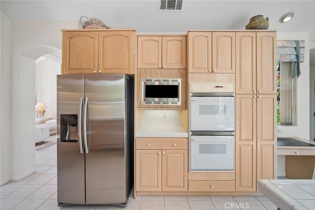 48 Siena, Laguna Niguel, CA 92677 - kitchen with appliances with stainless steel finishes, light brown cabinets, and tile countertops