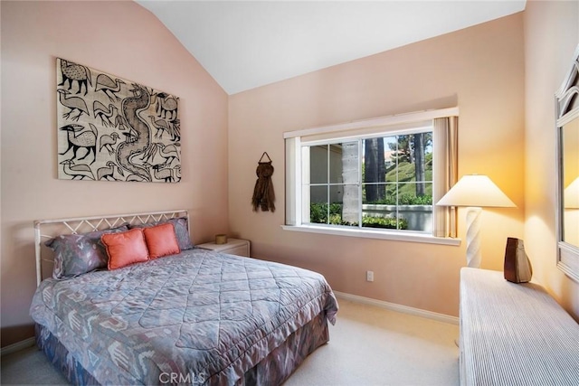 48 Siena, Laguna Niguel, CA 92677 - bedroom featuring carpet flooring, lofted ceiling, and baseboards