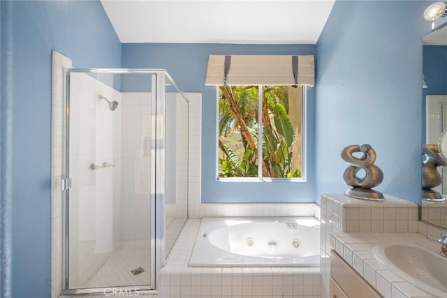 48 Siena, Laguna Niguel, CA 92677 - bathroom with a shower stall, a tub with jets, and vanity