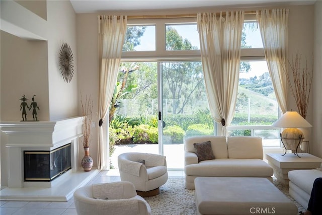 48 Siena, Laguna Niguel, CA 92677 - living room with tile patterned floors and a glass covered fireplace