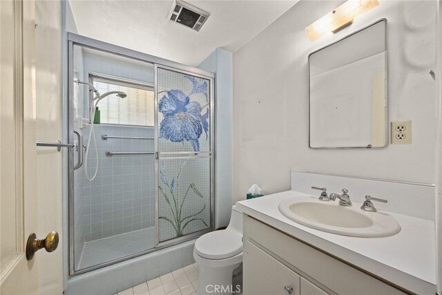 85 S San Rafael Ave, Pasadena, CA 91105 - bathroom with a shower stall, toilet, vanity, and tile patterned flooring