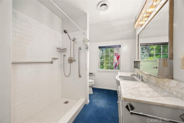 85 S San Rafael Ave, Pasadena, CA 91105 - full bath with a tile shower, vanity, toilet, and plenty of natural light