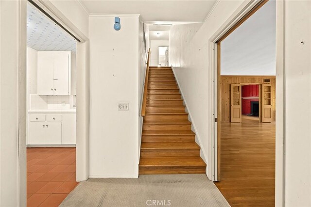 85 S San Rafael Ave, Pasadena, CA 91105 - stairs featuring tile patterned flooring and wooden walls