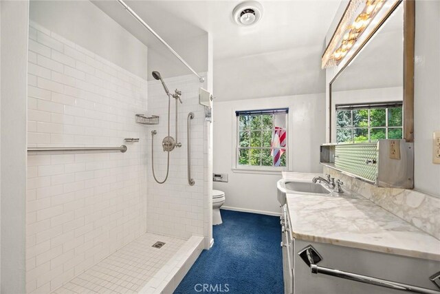 85 S San Rafael Ave, Pasadena, CA 91105 - full bath with a tile shower, vanity, toilet, and healthy amount of natural light