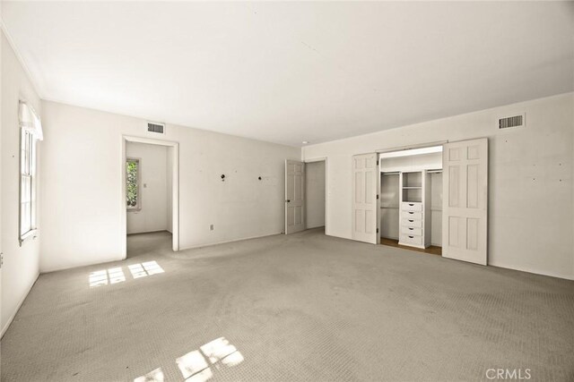 85 S San Rafael Ave, Pasadena, CA 91105 - unfurnished bedroom featuring light colored carpet and a closet
