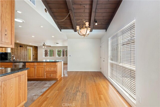 1825 Leola St, Lomita, CA 90717 - kitchen featuring dark countertops, light wood-type flooring, wooden ceiling with exposed beams, stainless steel dishwasher, and recessed lighting
