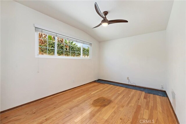 1825 Leola St, Lomita, CA 90717 - spare room featuring lofted ceiling, ceiling fan, and light wood-type flooring
