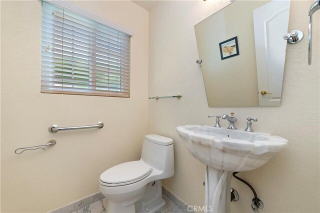 1825 Leola St, Lomita, CA 90717 - half bath featuring toilet and baseboards