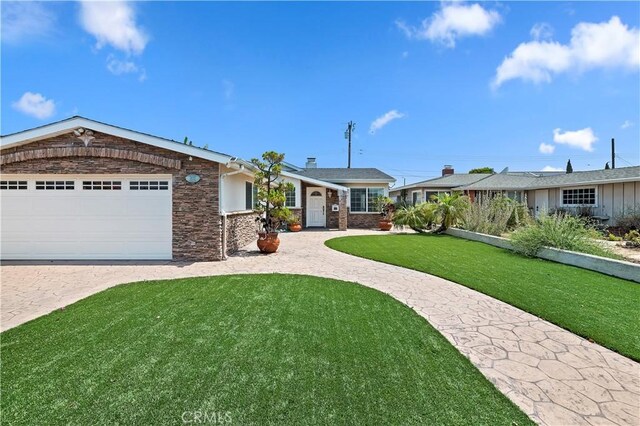 1825 Leola St, Lomita, CA 90717 - ranch-style home with a front yard, stone siding, an attached garage, and a chimney