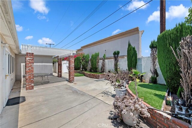 1825 Leola St, Lomita, CA 90717 - fenced backyard featuring a patio area and a pergola