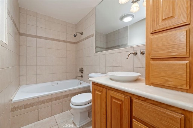 1825 Leola St, Lomita, CA 90717 - bathroom featuring tile walls, toilet, tiled shower / bath combo, tile patterned floors, and vanity