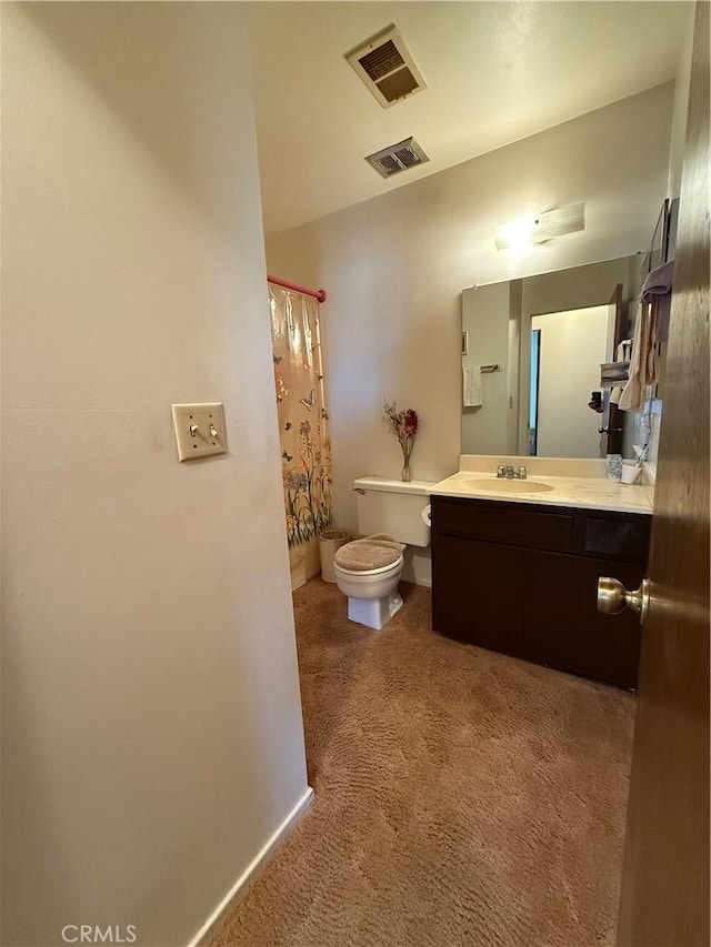 72400 El Paseo Dr Unit 29, Palms, CA 92277 - bathroom with toilet, vanity, a shower with shower curtain, and baseboards
