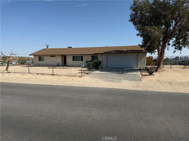 72400 El Paseo Dr Unit 29, Palms, CA 92277 - view of front of property with an attached garage and driveway