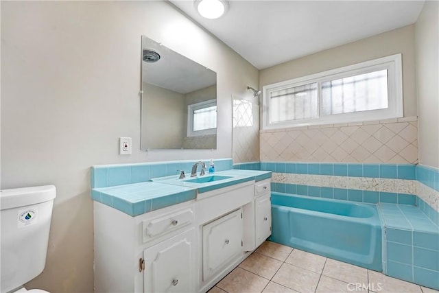 142 S Ardmore Ave, Los Angeles, CA 90004 - bathroom with a bathtub, toilet, vanity, and tile patterned floors