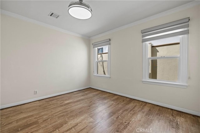 645 Glenmore Blvd, Glendale, CA 91206 - unfurnished room featuring wood finished floors, ornamental molding, and baseboards