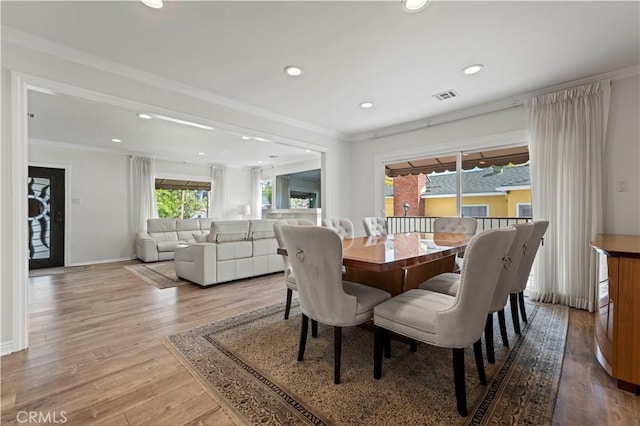 645 Glenmore Blvd, Glendale, CA 91206 - dining space with wood finished floors, recessed lighting, ornamental molding, and baseboards