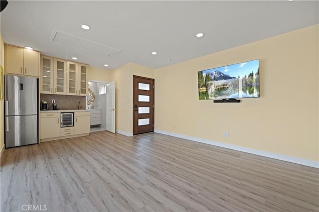645 Glenmore Blvd, Glendale, CA 91206 - kitchen with freestanding refrigerator, light wood-type flooring, backsplash, baseboards, and glass insert cabinets