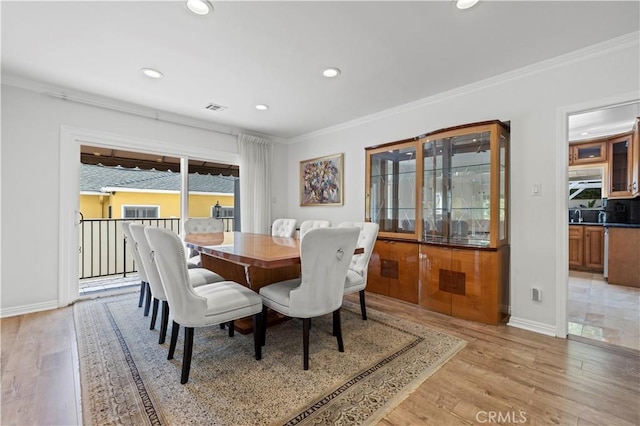 645 Glenmore Blvd, Glendale, CA 91206 - dining space featuring recessed lighting, ornamental molding, light wood-style floors, and baseboards