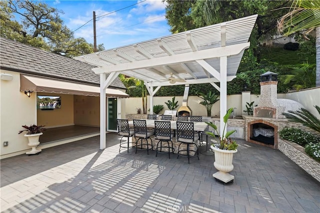 645 Glenmore Blvd, Glendale, CA 91206 - view of patio featuring exterior fireplace and a pergola