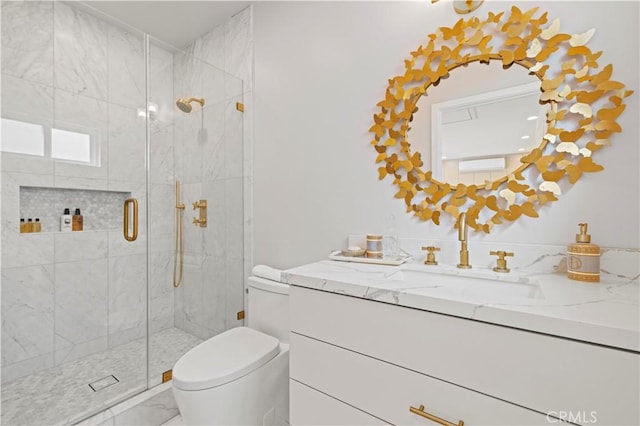 645 Glenmore Blvd, Glendale, CA 91206 - bathroom with vanity, toilet, marble look tile flooring, and a shower stall