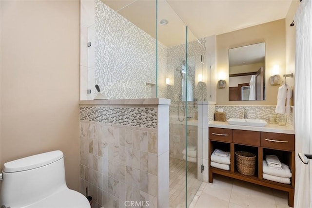 32661 Caribbean Dr, Dana Point, CA 92629 - full bathroom featuring tile walls, vanity, a shower stall, and tile patterned flooring