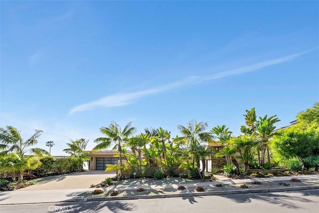 32661 Caribbean Dr, Dana Point, CA 92629 - view of front of house with driveway and an attached garage