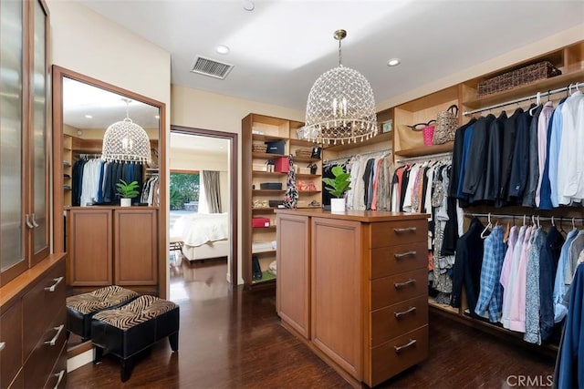 32661 Caribbean Dr, Dana Point, CA 92629 - spacious closet featuring a chandelier and dark wood-type flooring
