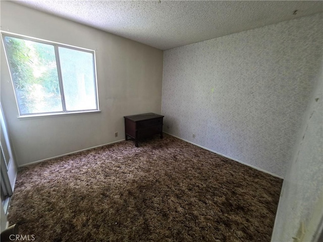 2108 Ardenwood Ave, Simi Valley, CA 93063 - carpeted empty room with a textured ceiling and baseboards