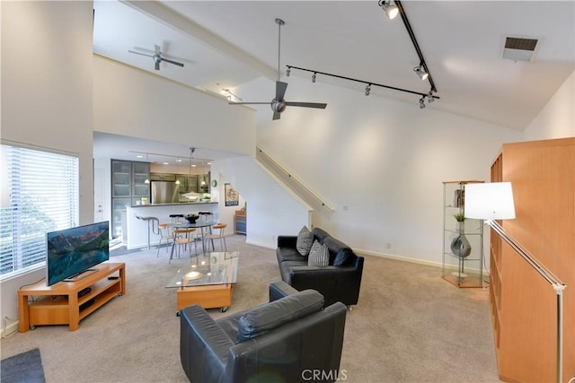 796 Via Colinas, Thousand Oaks, CA 91362 - living area featuring ceiling fan, high vaulted ceiling, light carpet, rail lighting, and baseboards