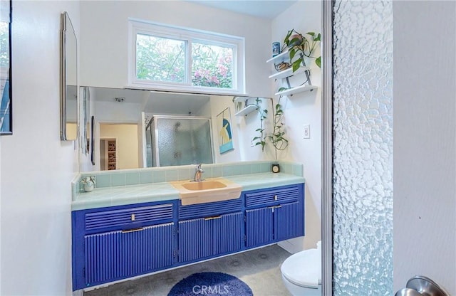 16733 Archwood St, Van Nuys, CA 91406 - bathroom featuring vanity, a shower stall, and toilet