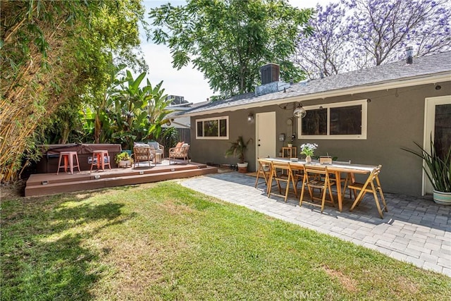 16733 Archwood St, Van Nuys, CA 91406 - view of yard featuring a wooden deck, a patio, a jacuzzi, and central air condition unit