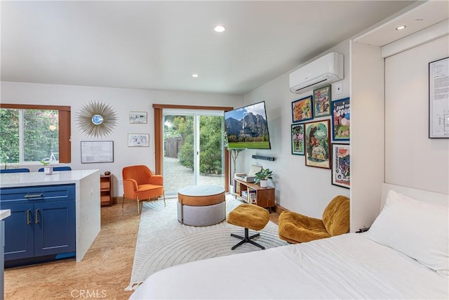 16733 Archwood St, Van Nuys, CA 91406 - bedroom featuring an AC wall unit, light wood-type flooring, recessed lighting, and access to exterior