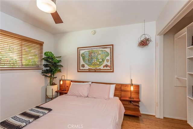 16733 Archwood St, Van Nuys, CA 91406 - bedroom with wood finished floors, a ceiling fan, and baseboards