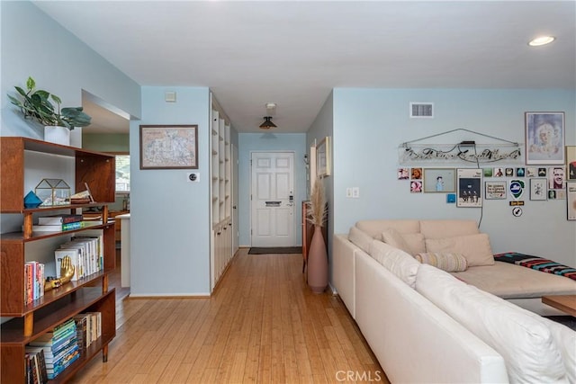 16733 Archwood St, Van Nuys, CA 91406 - living room with light wood finished floors and recessed lighting