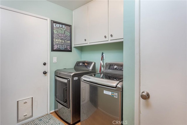 16733 Archwood St, Van Nuys, CA 91406 - washroom with cabinet space, independent washer and dryer, and light wood-style floors