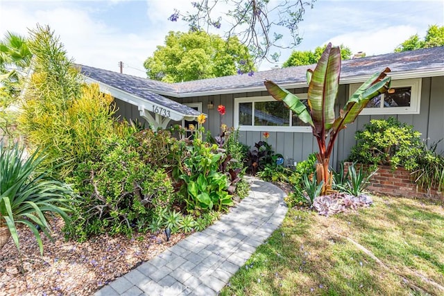 16733 Archwood St, Van Nuys, CA 91406 - view of front of house with a shingled roof and board and batten siding