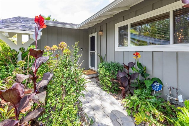 16733 Archwood St, Van Nuys, CA 91406 - doorway to property featuring board and batten siding