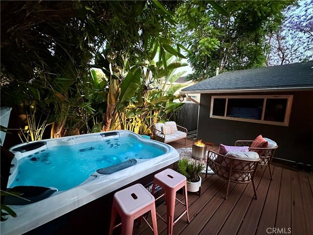 16733 Archwood St, Van Nuys, CA 91406 - wooden deck featuring an outdoor fire pit and a hot tub