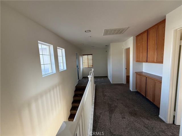 7434 Freeport Cir, Fontana, CA 92336 - hallway featuring dark colored carpet and stairs