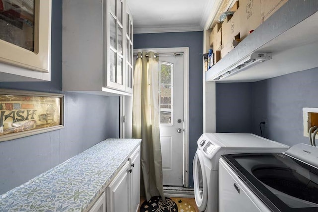 11073 Andrews St, South El Monte, CA 91733 - laundry room featuring washer and clothes dryer, crown molding, and cabinet space