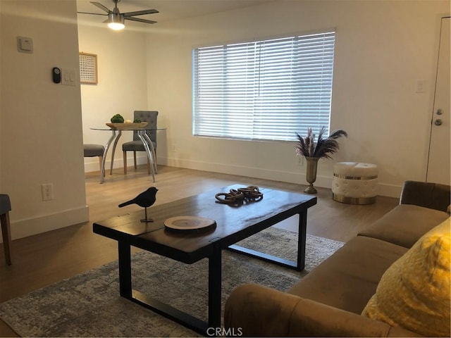 3337 S Durango Ave, Los Angeles, CA 90034 - living room with ceiling fan, wood finished floors, and baseboards
